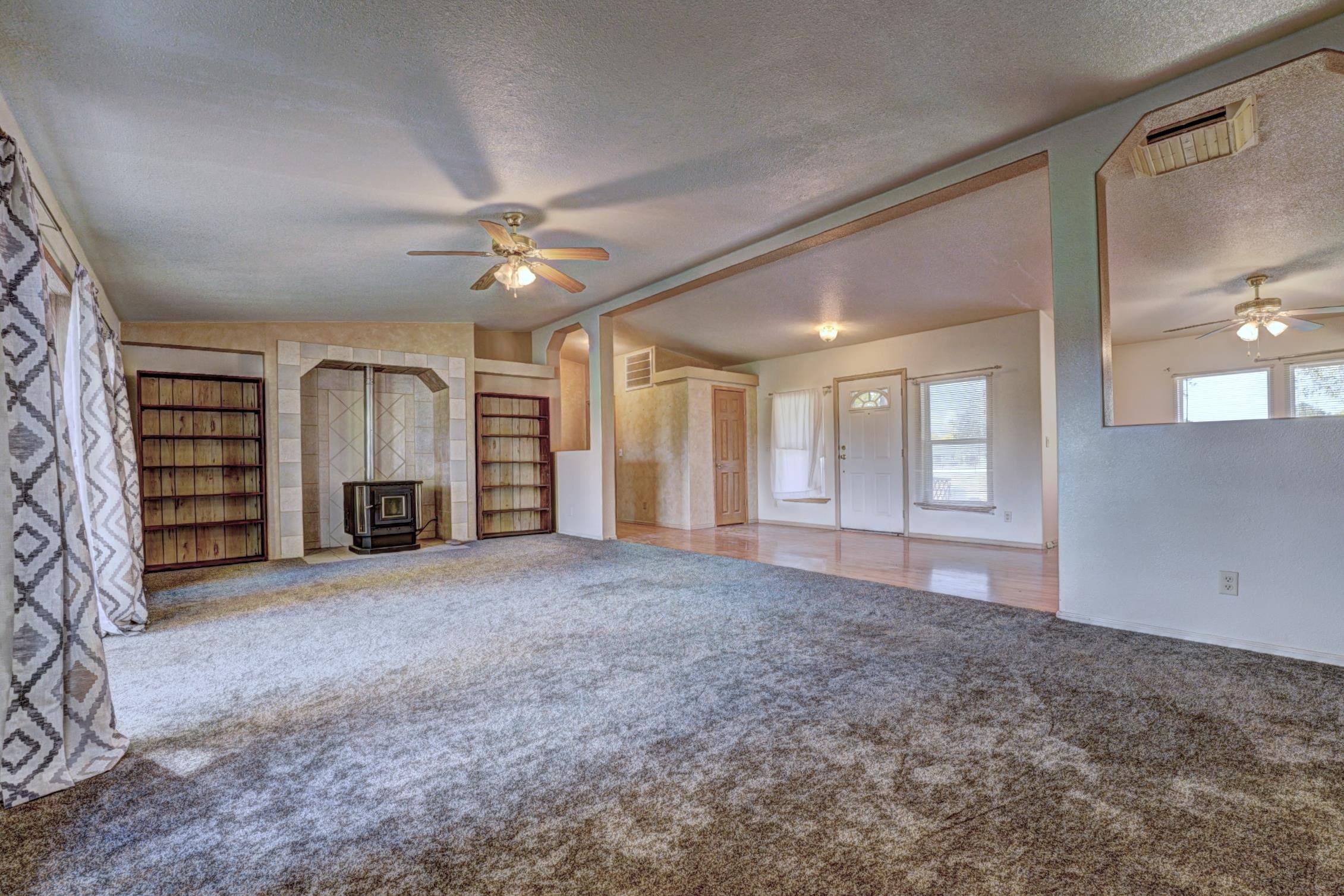 694-29 29 1/2 Road Grand Junction, CO 81504 - Photo 6 of 27 a view of empty room with a ceiling fan and window
