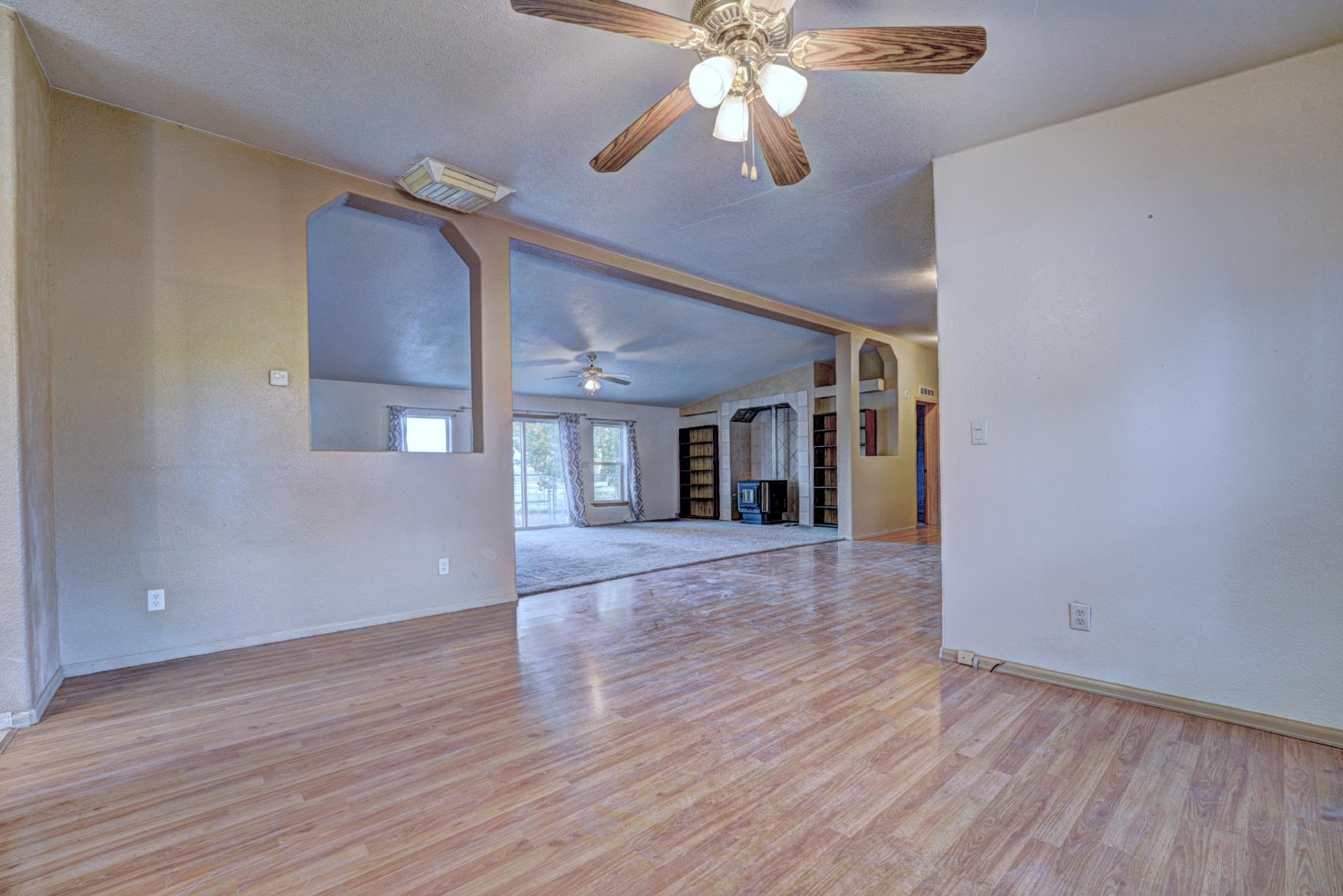 694-29 29 1/2 Road Grand Junction, CO 81504 - Photo 8 of 27 wooden floor in an empty room with a window