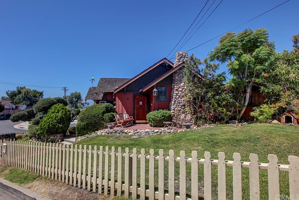 310 Hawthorne Road Laguna Beach, CA 92651 - Photo 2 of 25 a front view of a house having yard