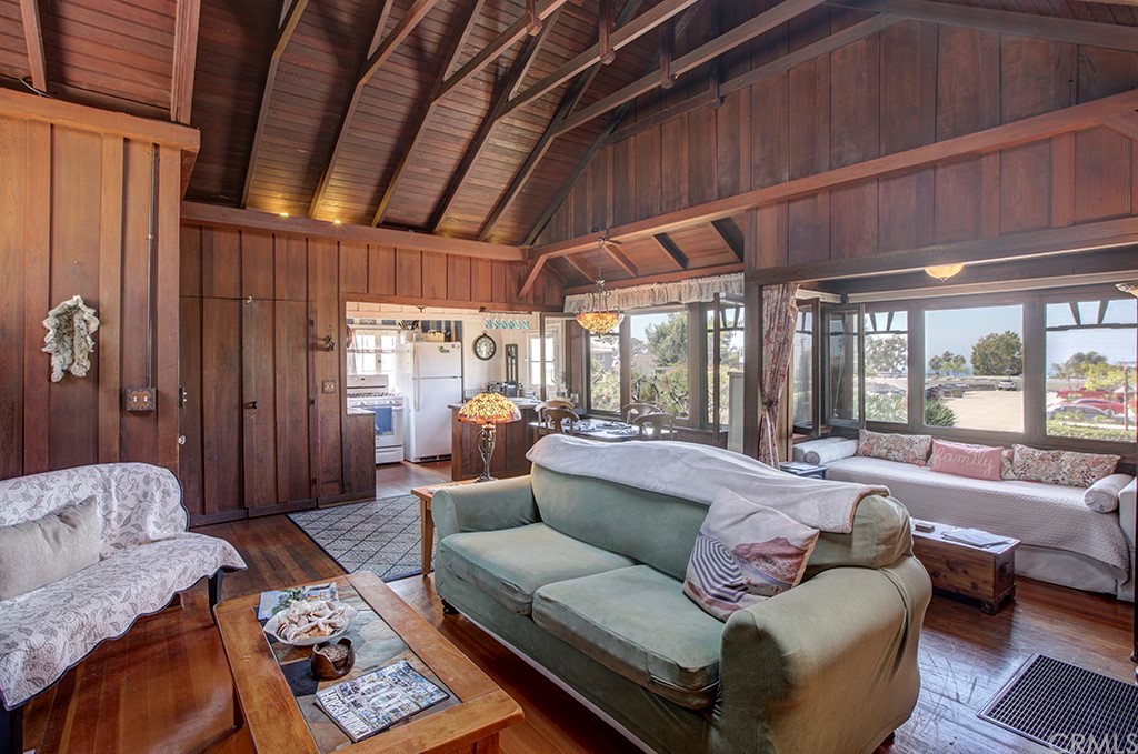 310 Hawthorne Road Laguna Beach, CA 92651 - Photo 9 of 25 a living room with furniture and a large window