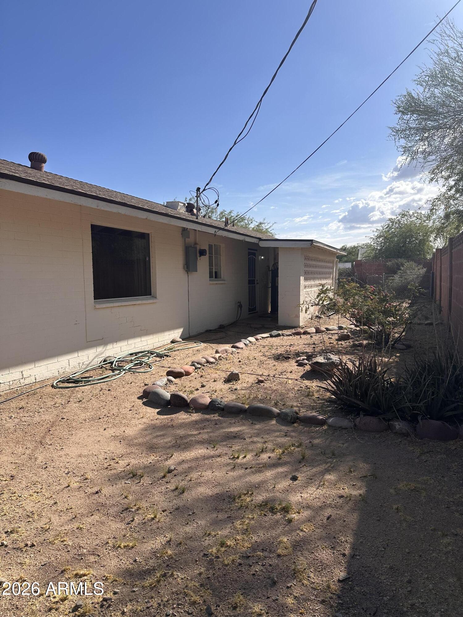 2821 West Elliot Road Laveen, AZ 85339 - Photo 77 of 92 a view of a backyard of the house