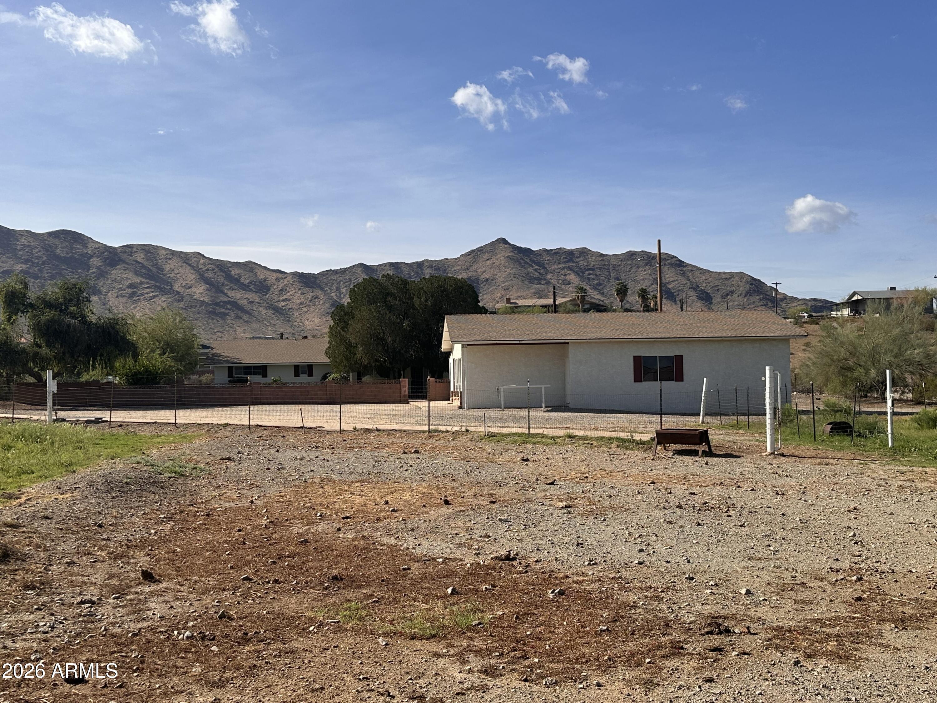 2821 West Elliot Road Laveen, AZ 85339 - Photo 85 of 92 a house view with a outdoor space