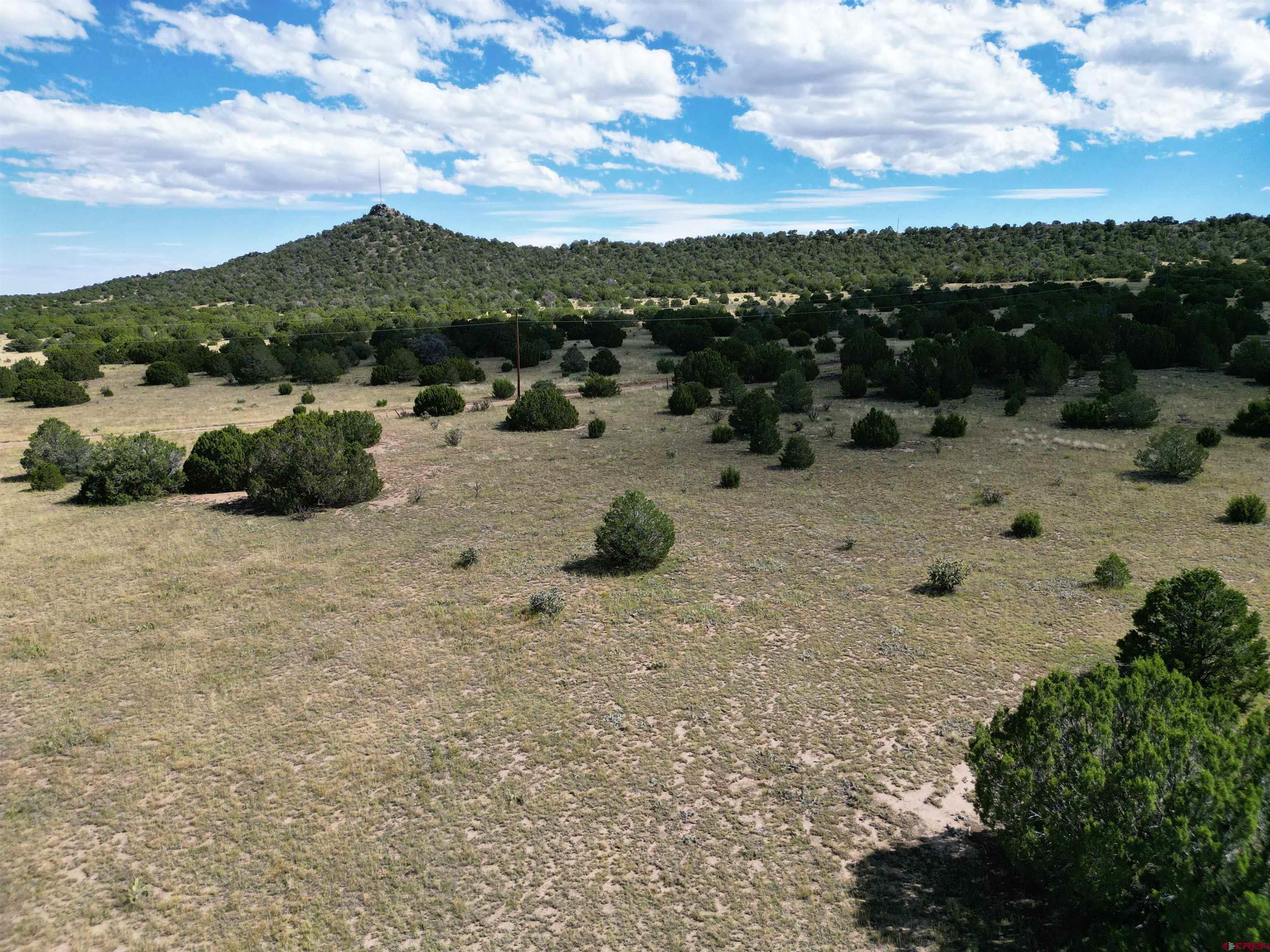 911-914 Rio Cucharas, Unit PH3 Walsenburg, CO 81089 - Photo 7 of 14 a view of a lake with mountain