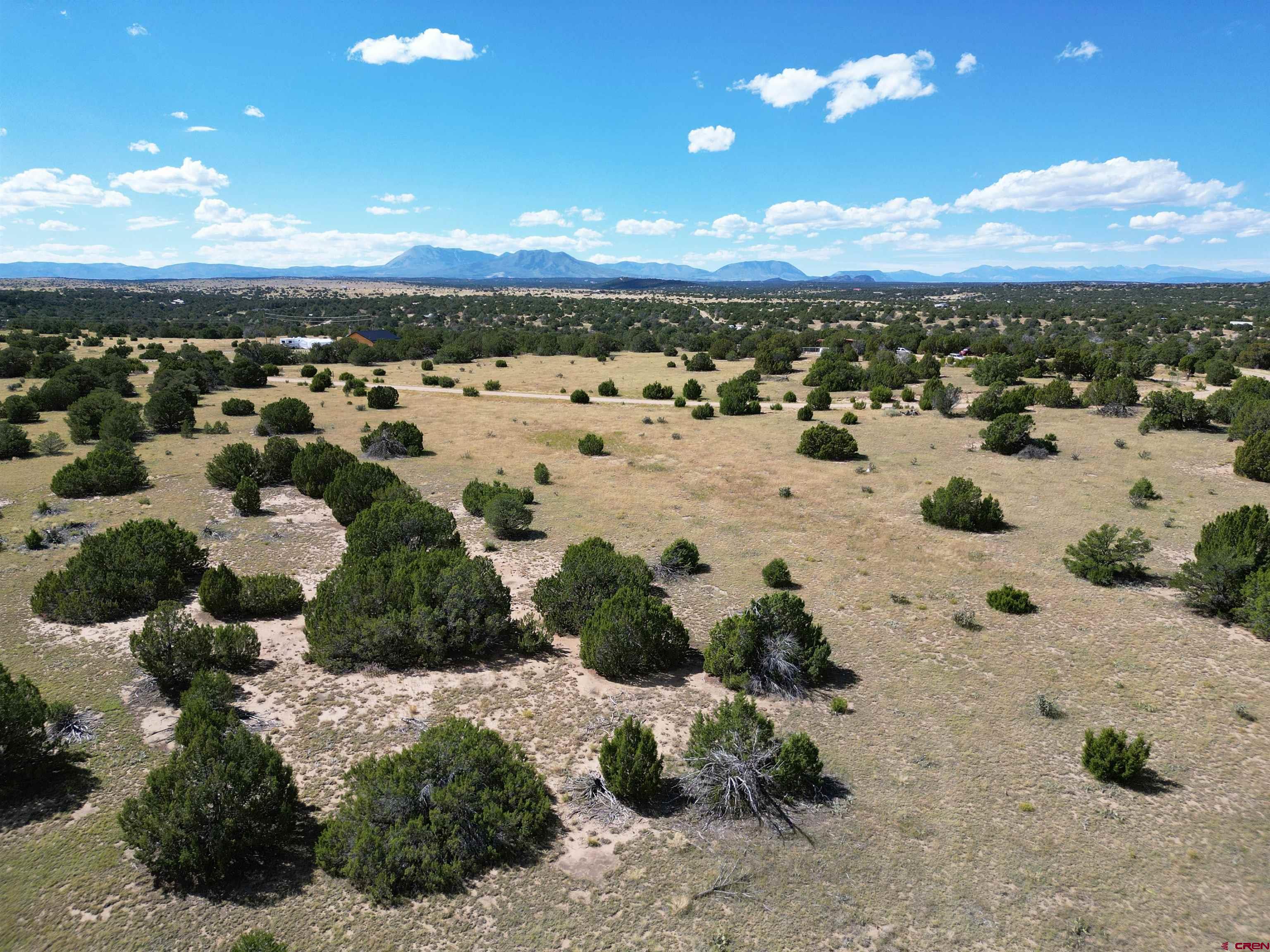 911-914 Rio Cucharas, Unit PH3 Walsenburg, CO 81089 - Photo 9 of 14 a view of lake with mountain