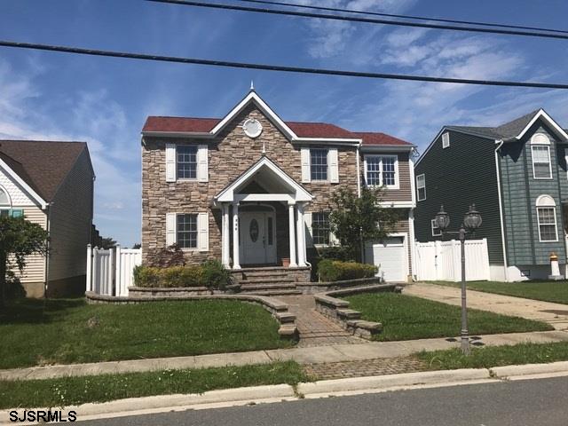 228 Hagen Road Brigantine, NJ 08203 - Photo 1 of 1 a front view of a house with a yard