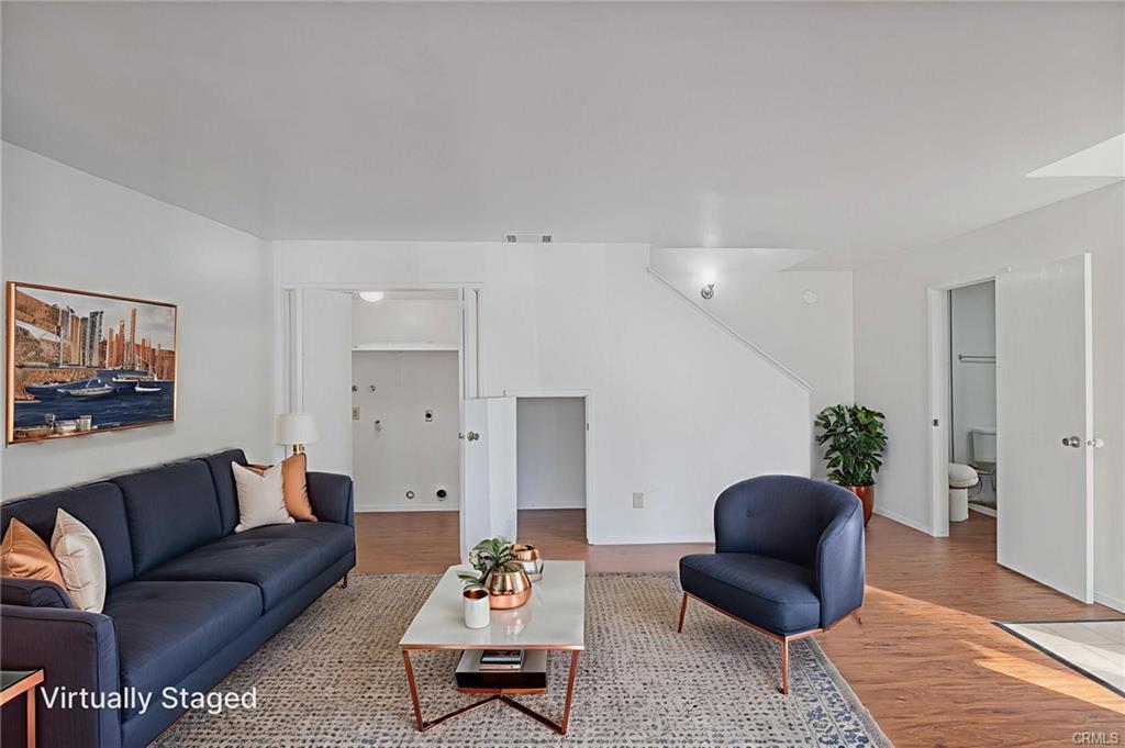 49400 River Park Road, Unit 17 Oakhurst, CA 93644 - Photo 6 of 34 a living room with furniture and wooden floor