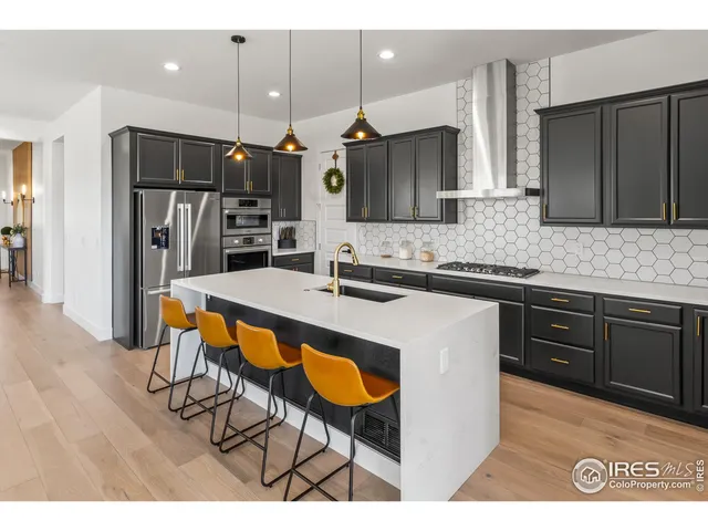 $795,000 | 1631 Sundown Run Drive, Windsor, CO 80550