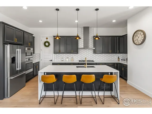 $795,000 | 1631 Sundown Run Drive, Windsor, CO 80550