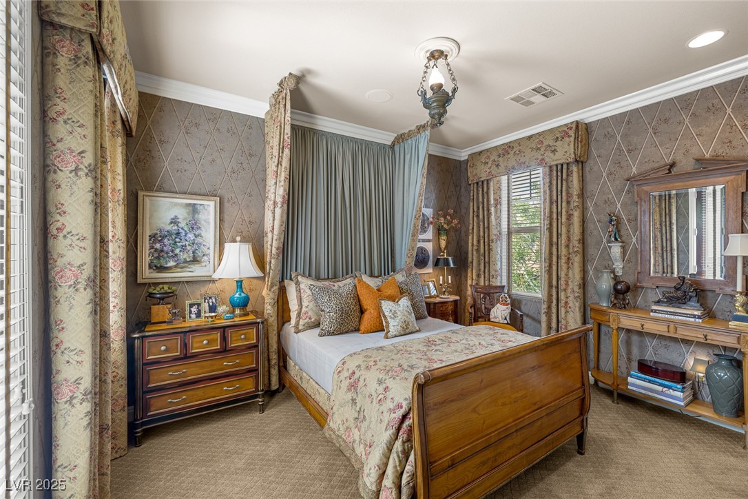 11280 Granite Ridge Drive, Unit 1057 Las Vegas, NV 89135 - Photo 27 of 46 Bedroom featuring wallpapered walls, crown molding, and carpet floors