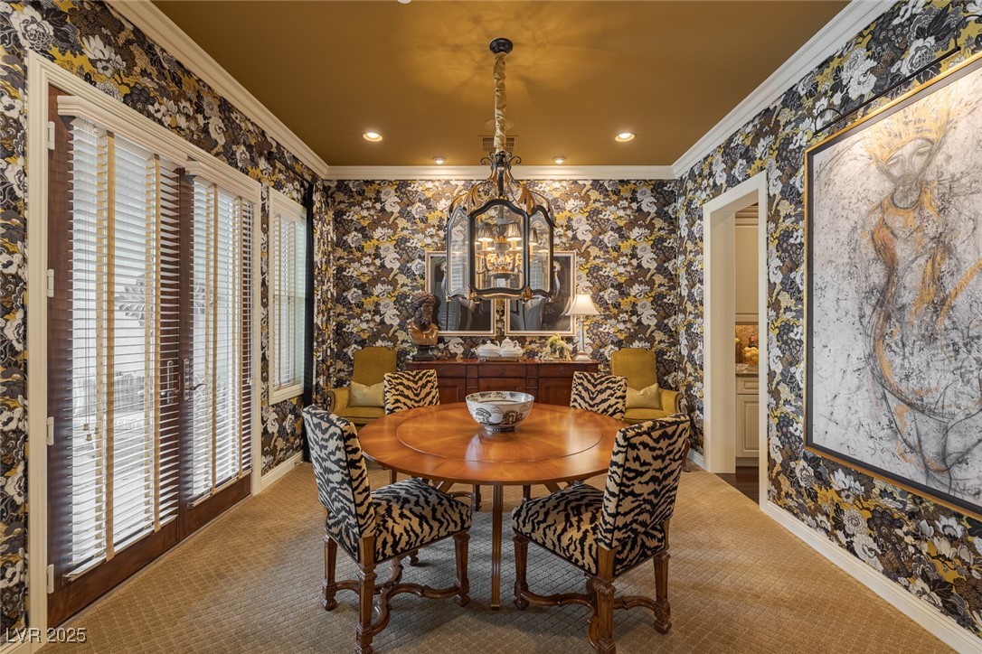 11280 Granite Ridge Drive, Unit 1057 Las Vegas, NV 89135 - Photo 4 of 46 Dining space featuring wallpapered walls, ornamental molding, carpet floors, a chandelier, and recessed lighting