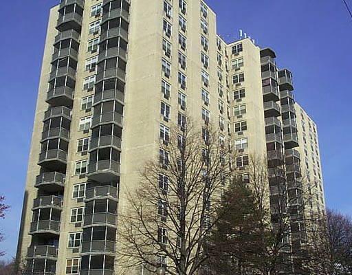 50 Glenbrook Road, Unit 14F Stamford, CT 06902 - Photo 1 of 1 front view of a tall building