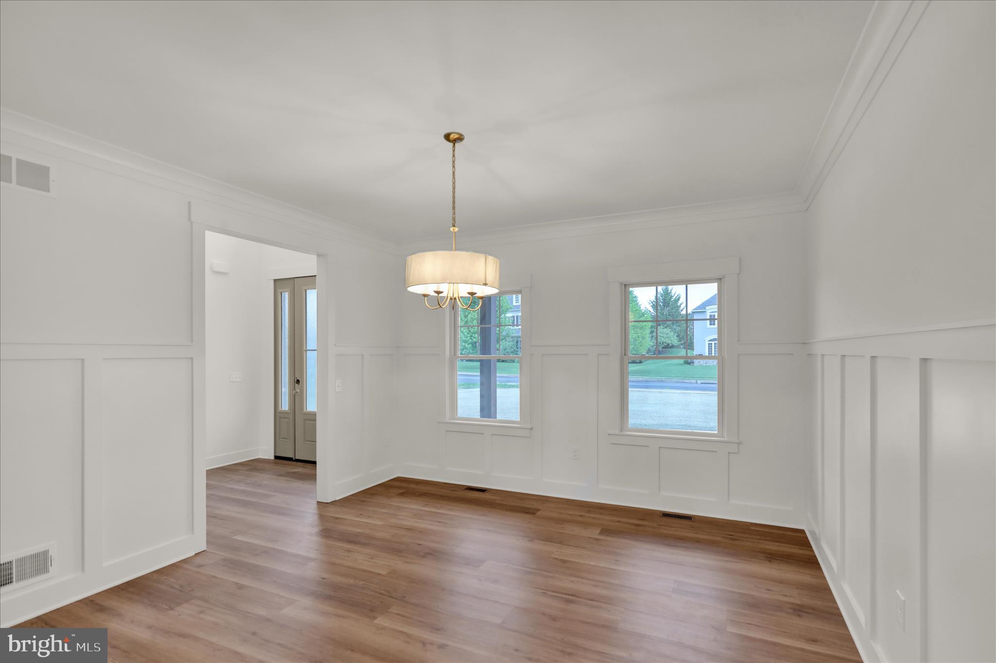 513 Cheltenham Court Lititz, PA 17543 - Photo 32 of 64 a view of empty room with wooden floor and window