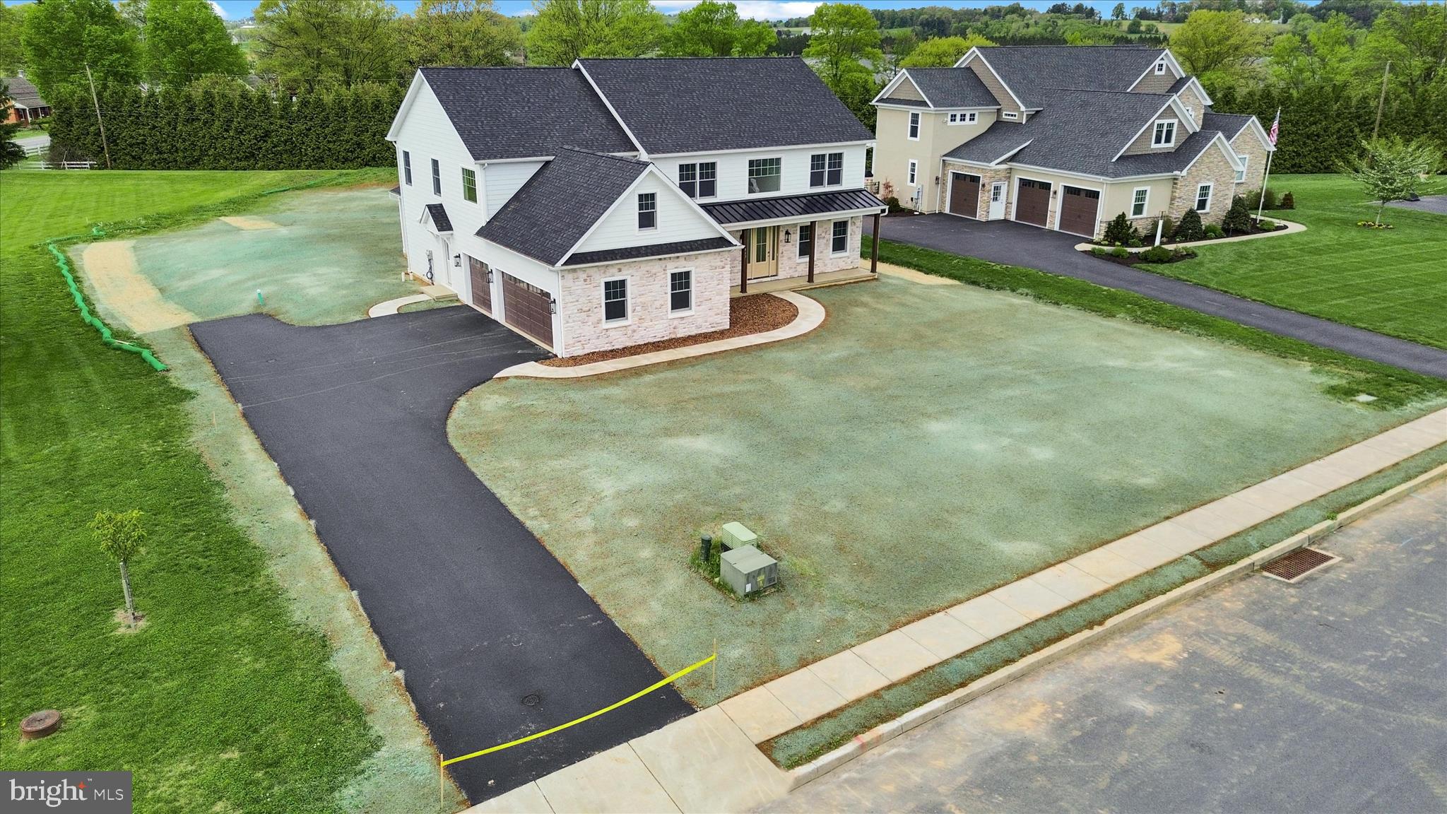 513 Cheltenham Court Lititz, PA 17543 - Photo 4 of 64 an aerial view of a house with swimming pool garden and trees