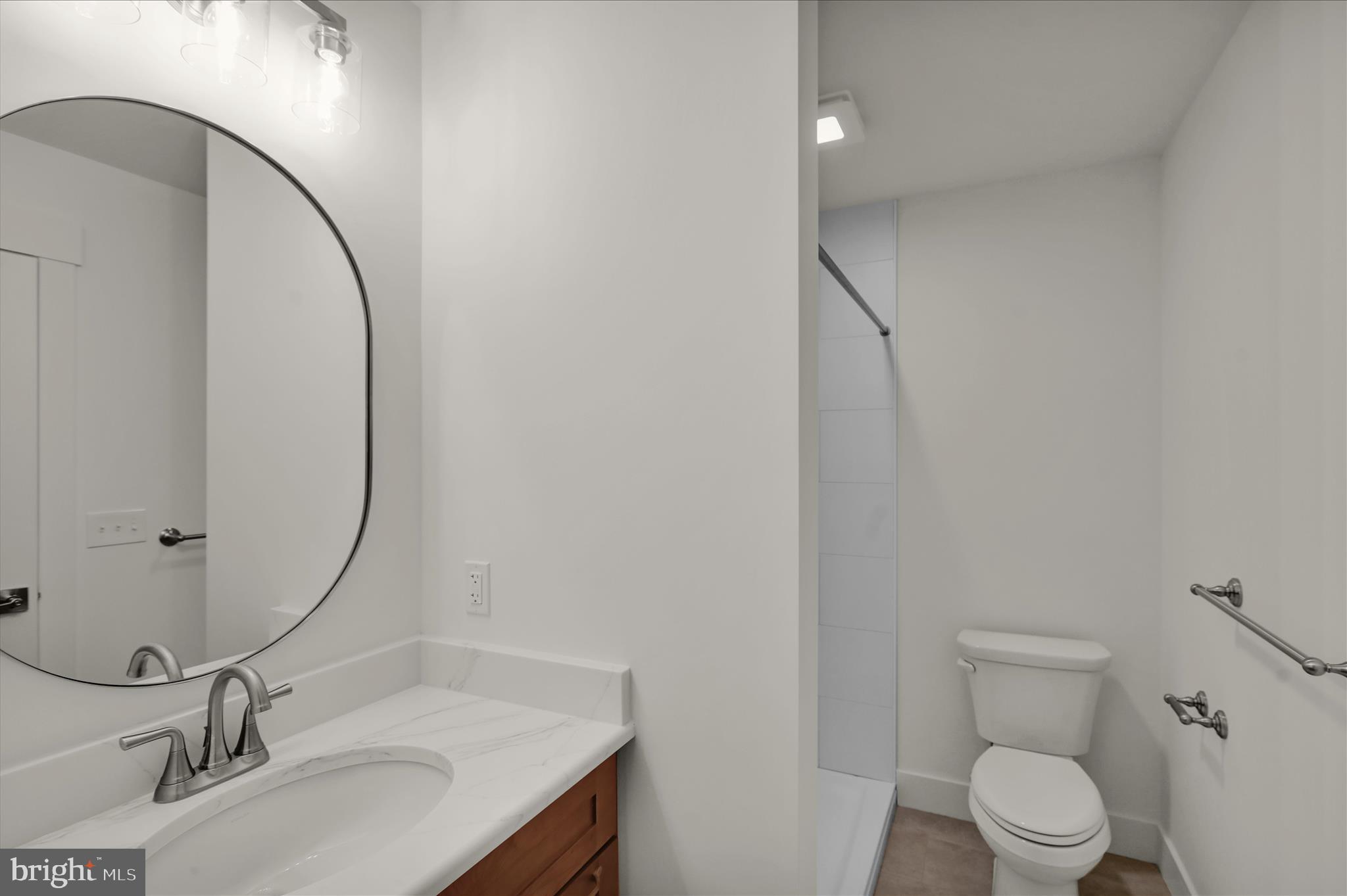 513 Cheltenham Court Lititz, PA 17543 - Photo 46 of 64 a bathroom with a sink and a mirror