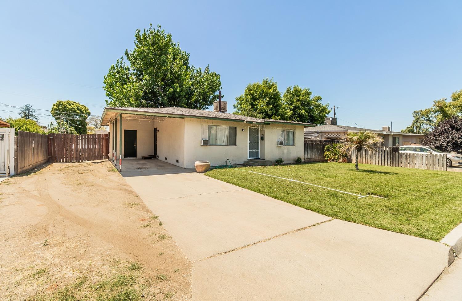 922 Music Avenue Clovis, CA 93612 - Photo 19 of 20 a view of a house with a backyard