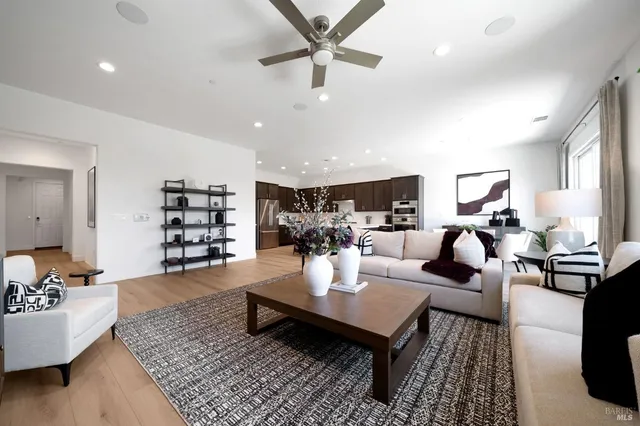 a living room with furniture or couch and a table