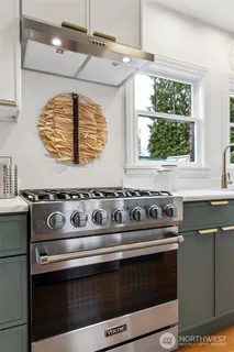 a kitchen with a sink and a window