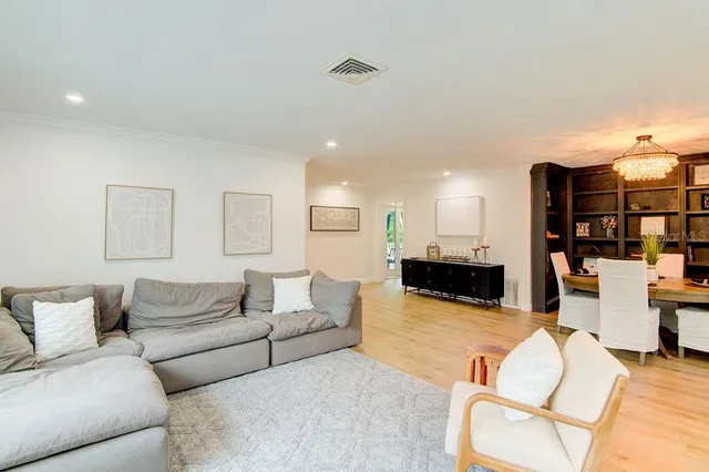 a view of a living room and dining room