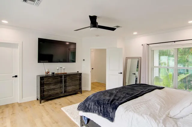 an aerial view of a house with yard and outdoor seating