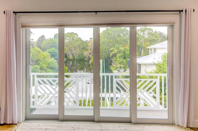 a view of a swimming pool with a patio