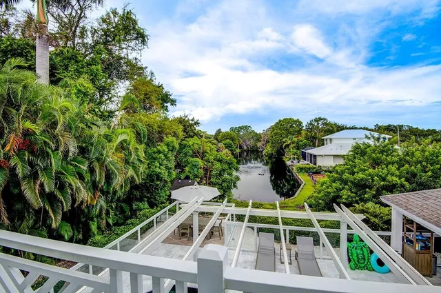 a view of swimming pool with outdoor seating