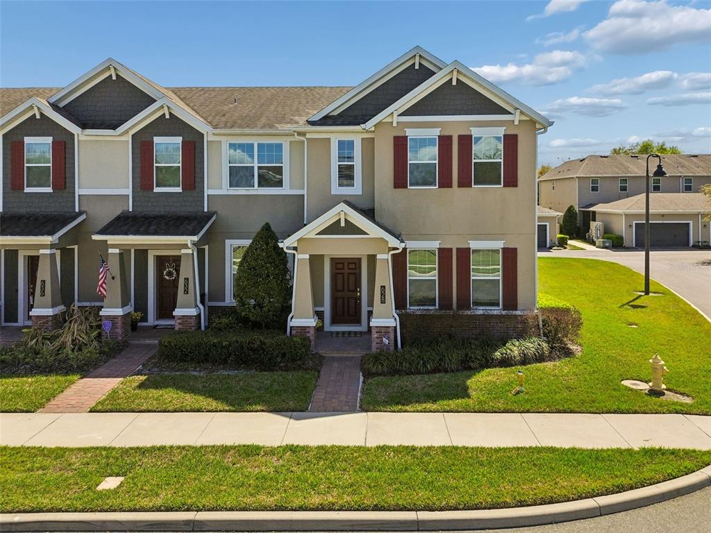 628 Orange Belt Loop Winter Garden, FL 34787 - Photo 1 of 1 a front view of a house with garden