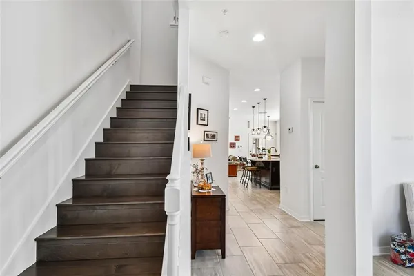 a bathroom with a shower and a sink