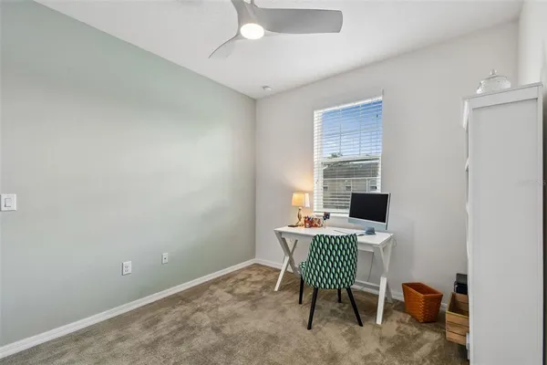 an aerial view of a house with swimming pool yard and outdoor seating