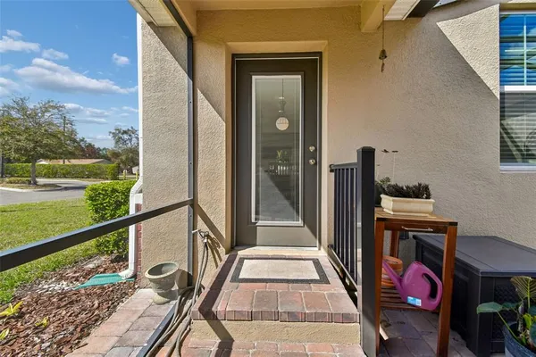 a front view of a house with a yard and a garage