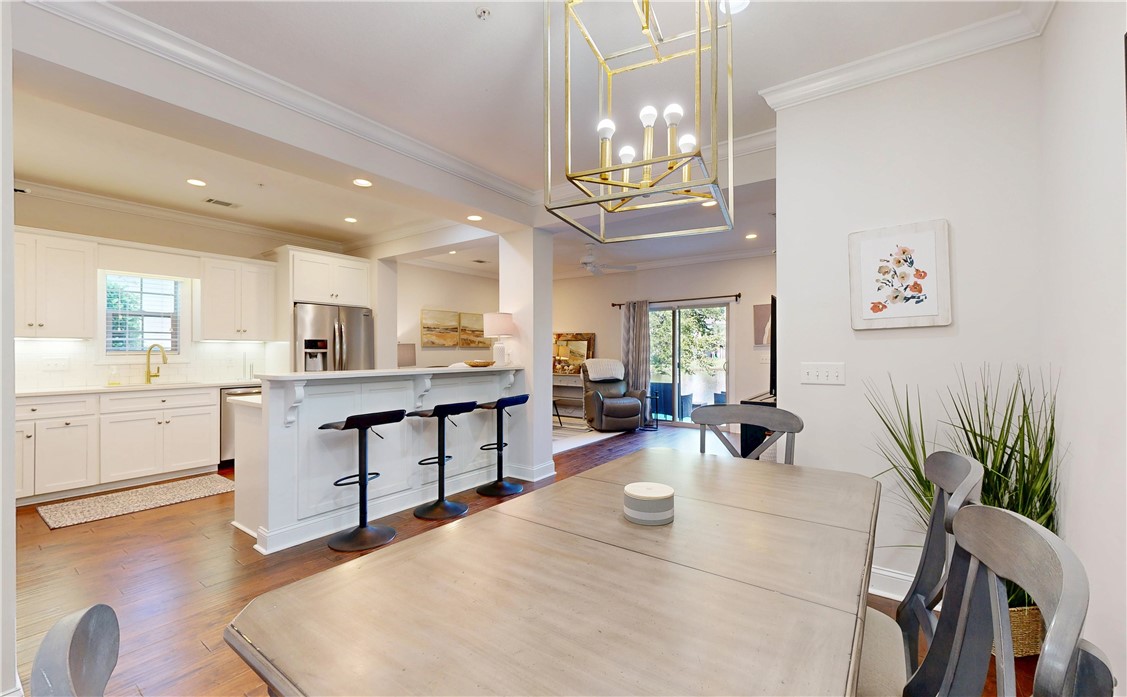1001 Reserve Lane St. Simons Island, GA 31522 - Photo 8 of 28 Dining Room to Kitchen