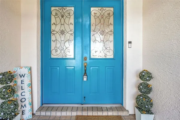 a kitchen with stainless steel appliances a refrigerator and cabinets