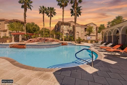10550 West Alexander Road, Unit 2091 Las Vegas, NV 89129 - Photo 2 of 43 Resort style pool, hot tub, & clubhouse.