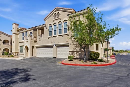 10550 West Alexander Road, Unit 2091 Las Vegas, NV 89129 - Photo 3 of 43 Chateau style architechture.