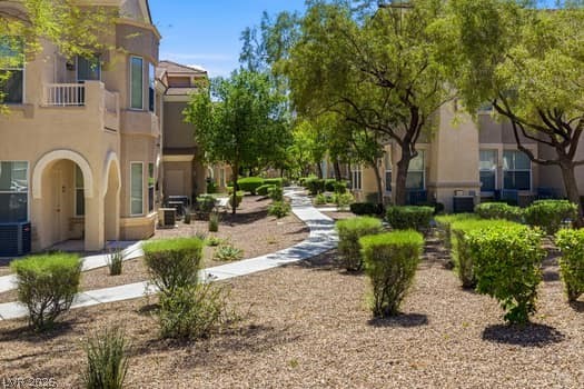 10550 West Alexander Road, Unit 2091 Las Vegas, NV 89129 - Photo 4 of 43 Serene walking paths with mature landscaping just outside your door.