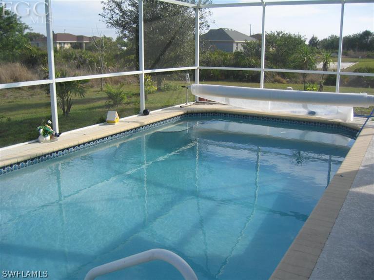 3618 20th Street Southwest Lehigh Acres, FL 33976 - Photo 3 of 12 a view of outdoor space with swimming pool