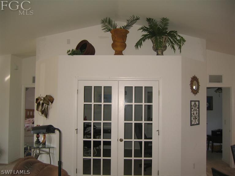 3618 20th Street Southwest Lehigh Acres, FL 33976 - Photo 7 of 12 a view of front door