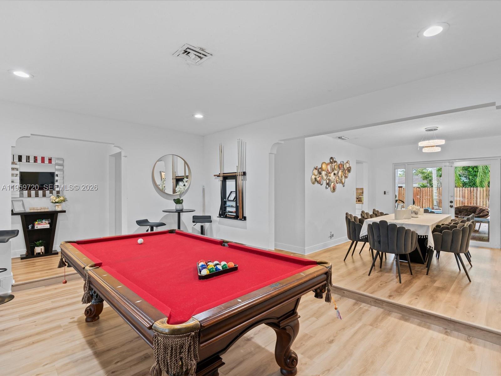 1113 North 46th Terrace Hollywood, FL 33021 - Photo 15 of 41 a room with pool table and a table