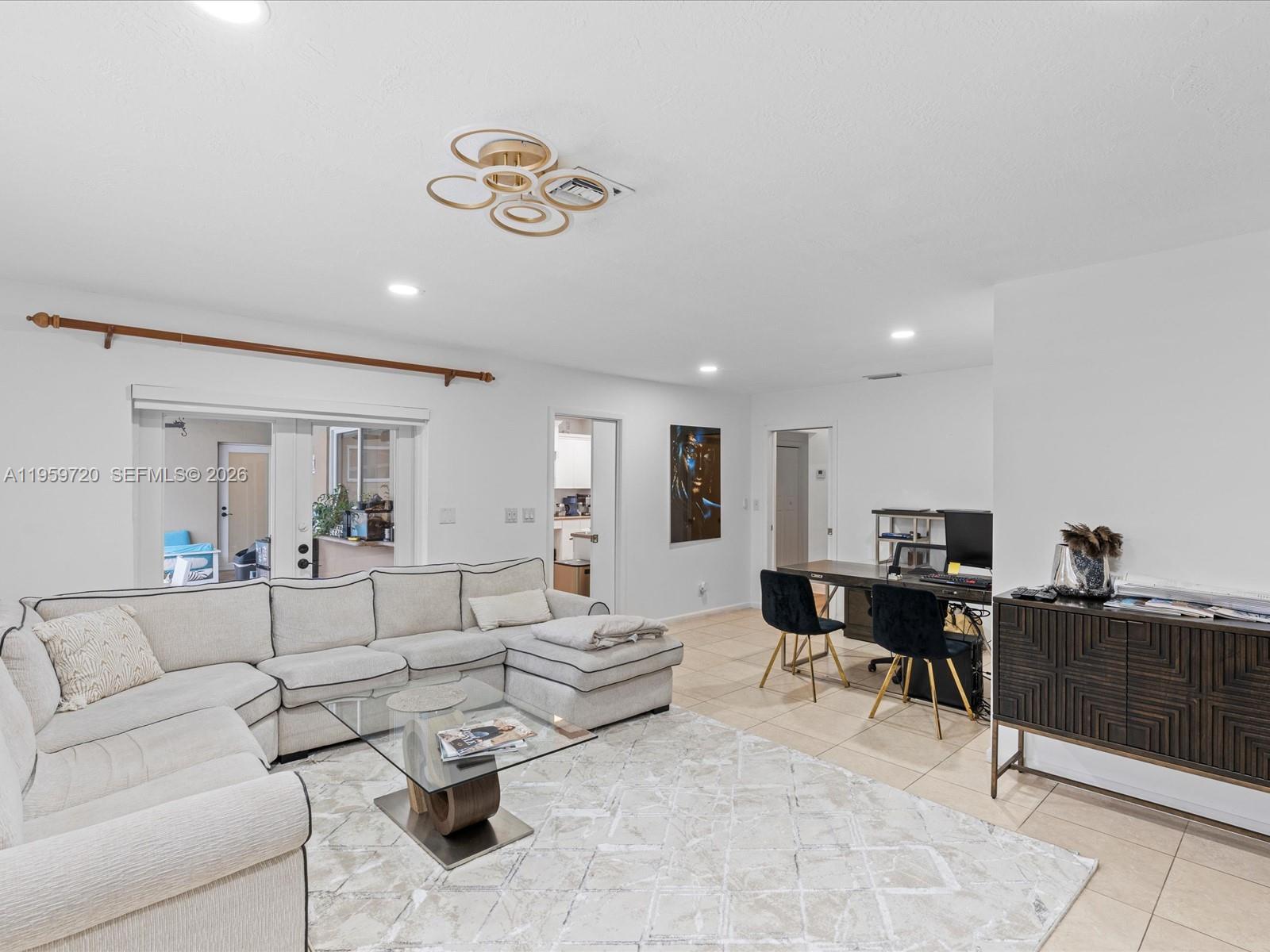 1113 North 46th Terrace Hollywood, FL 33021 - Photo 23 of 41 a living room with furniture