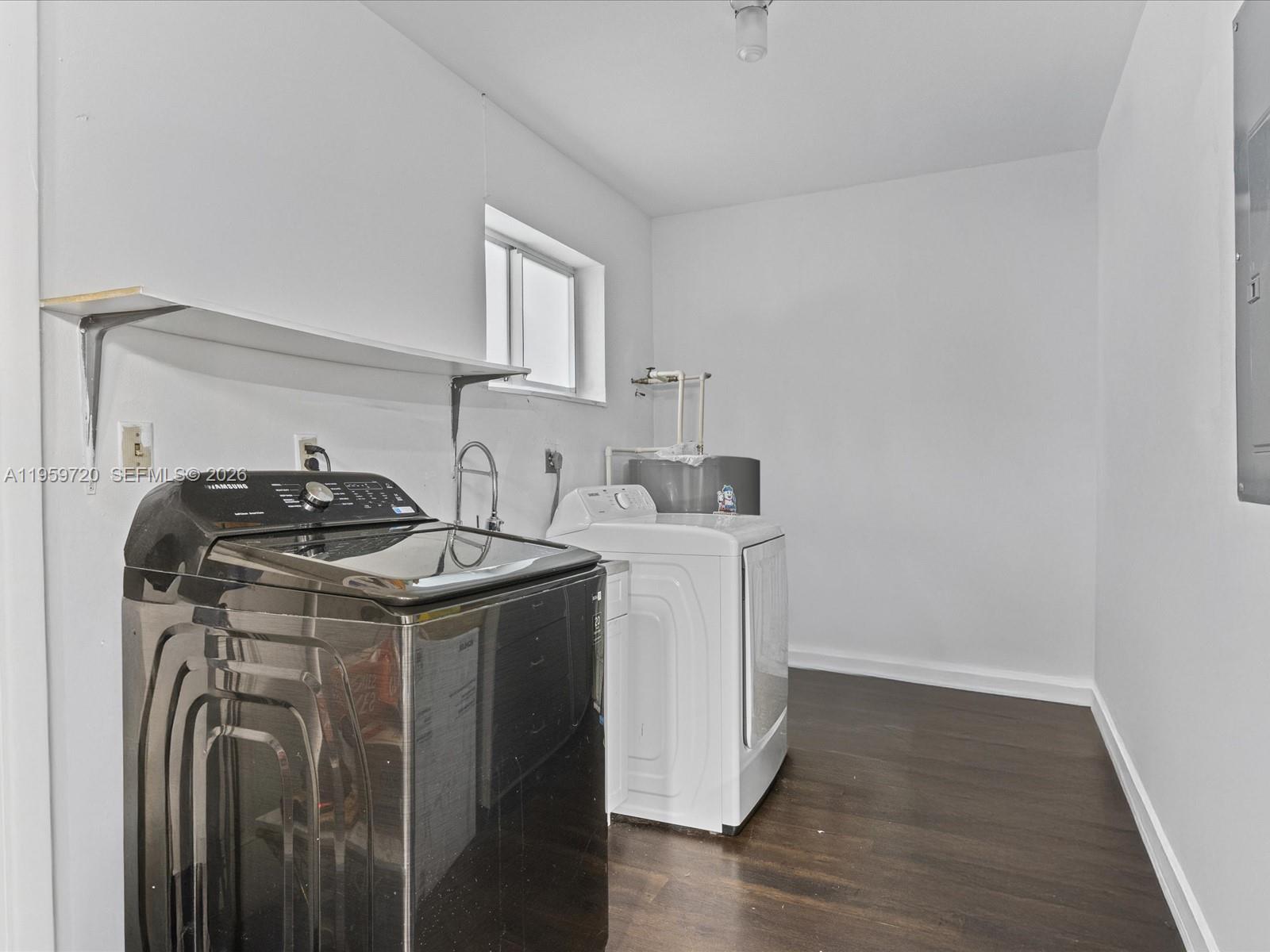 1113 North 46th Terrace Hollywood, FL 33021 - Photo 25 of 41 a utility room with dryer and washer