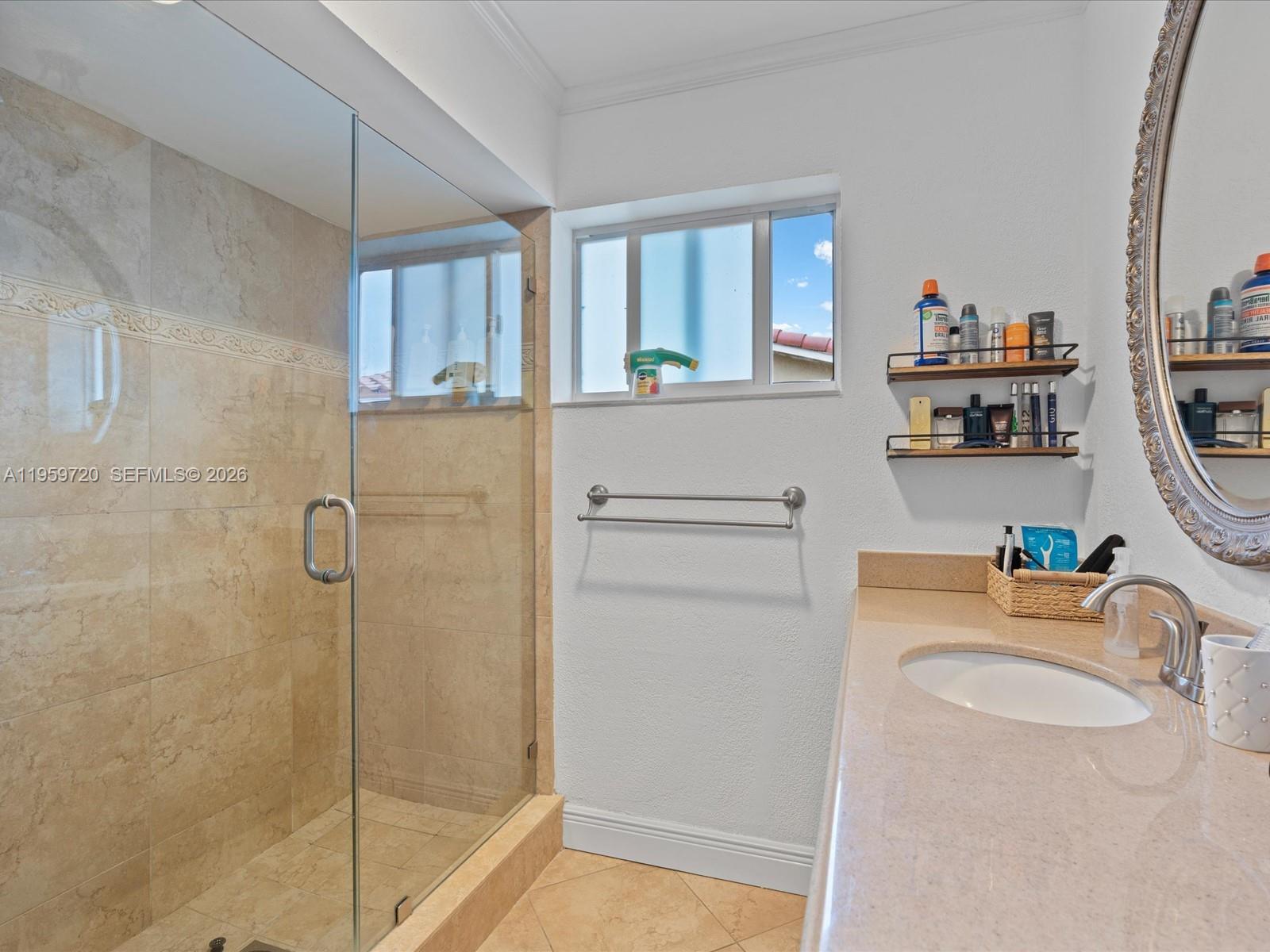 1113 North 46th Terrace Hollywood, FL 33021 - Photo 28 of 41 a bathroom with a tub sink and mirror