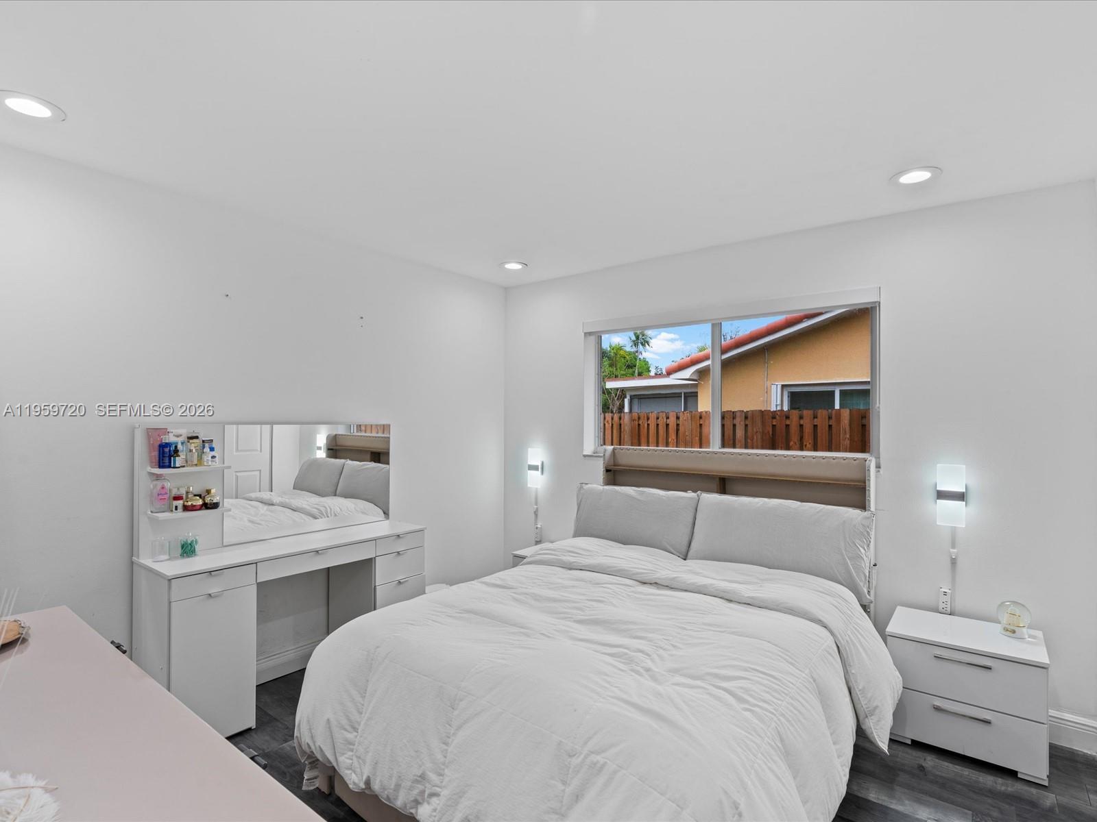 1113 North 46th Terrace Hollywood, FL 33021 - Photo 29 of 41 a bedroom with a bed and a closet