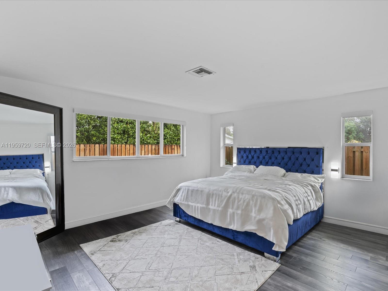 1113 North 46th Terrace Hollywood, FL 33021 - Photo 34 of 41 a bedroom with a bed and window