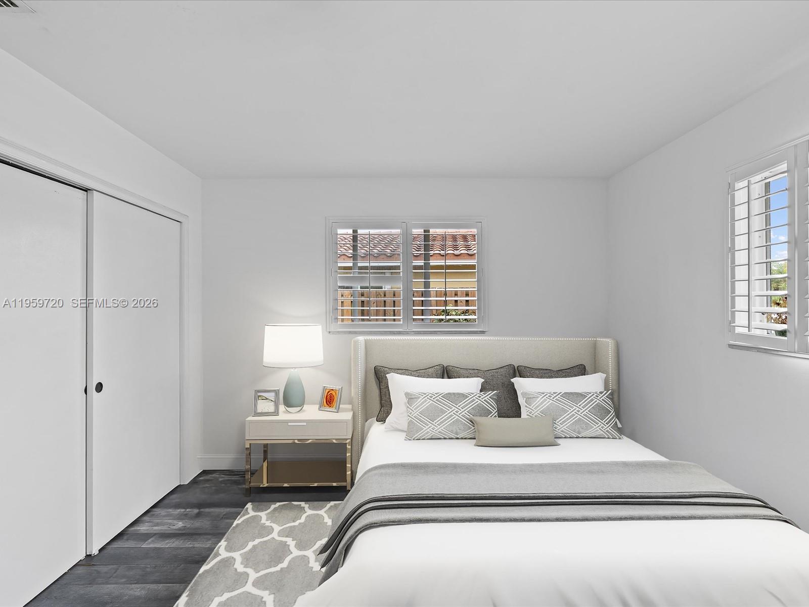 1113 North 46th Terrace Hollywood, FL 33021 - Photo 41 of 41 a bedroom with a bed and window