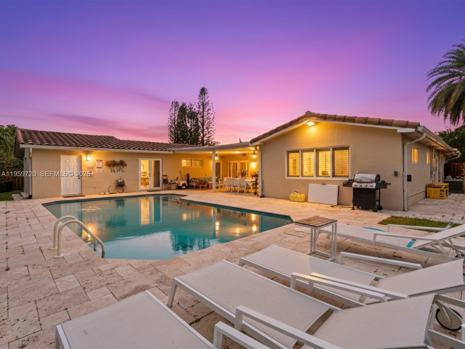 1113 North 46th Terrace Hollywood, FL 33021 - Photo 7 of 41 a view of a house with swimming pool