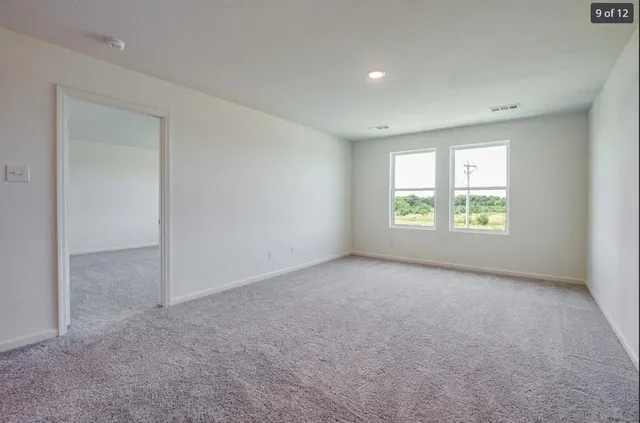 an empty room with windows