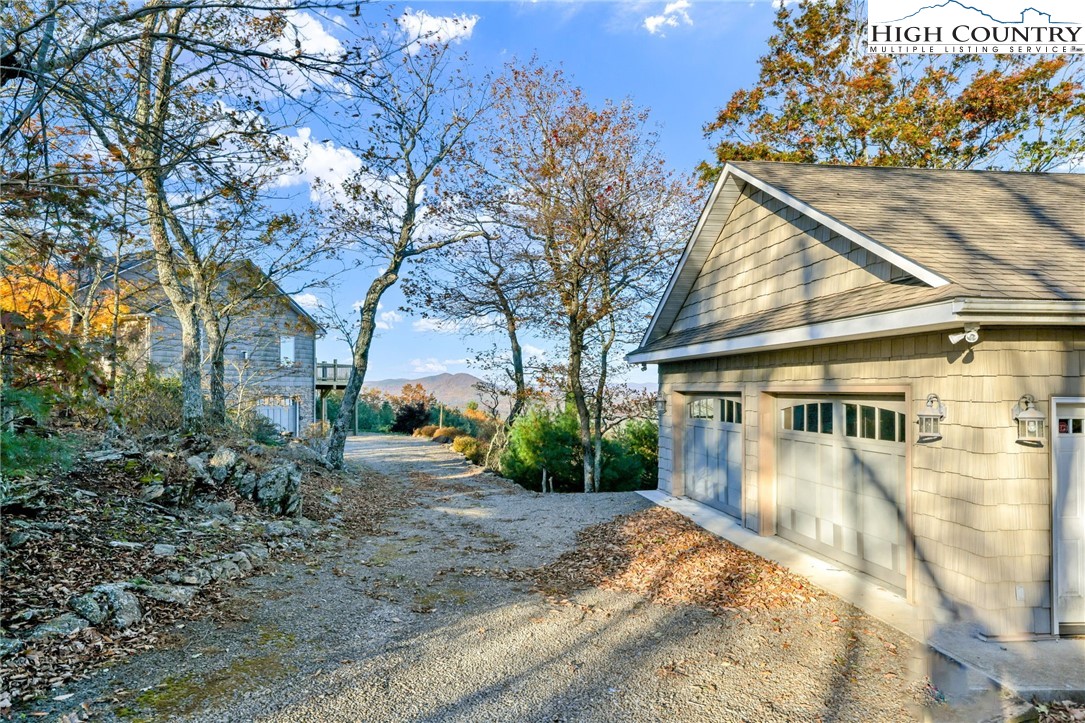 324 Rocky Ridge Lane Glade Valley, NC 28627 - Photo 16 of 43 a view of a house with a yard and pathway