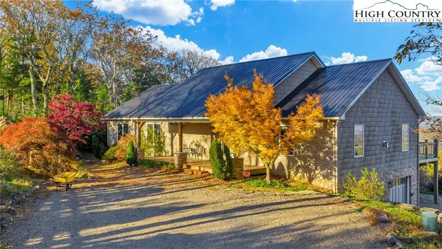 a view of a house with a street
