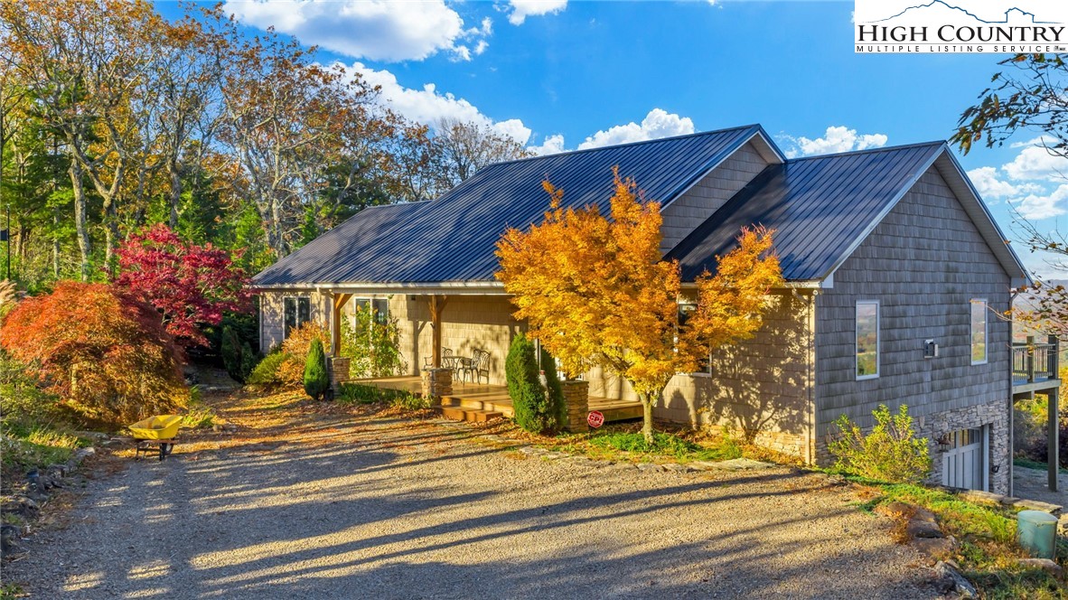 324 Rocky Ridge Lane Glade Valley, NC 28627 - Photo 2 of 43 a view of a house with a street