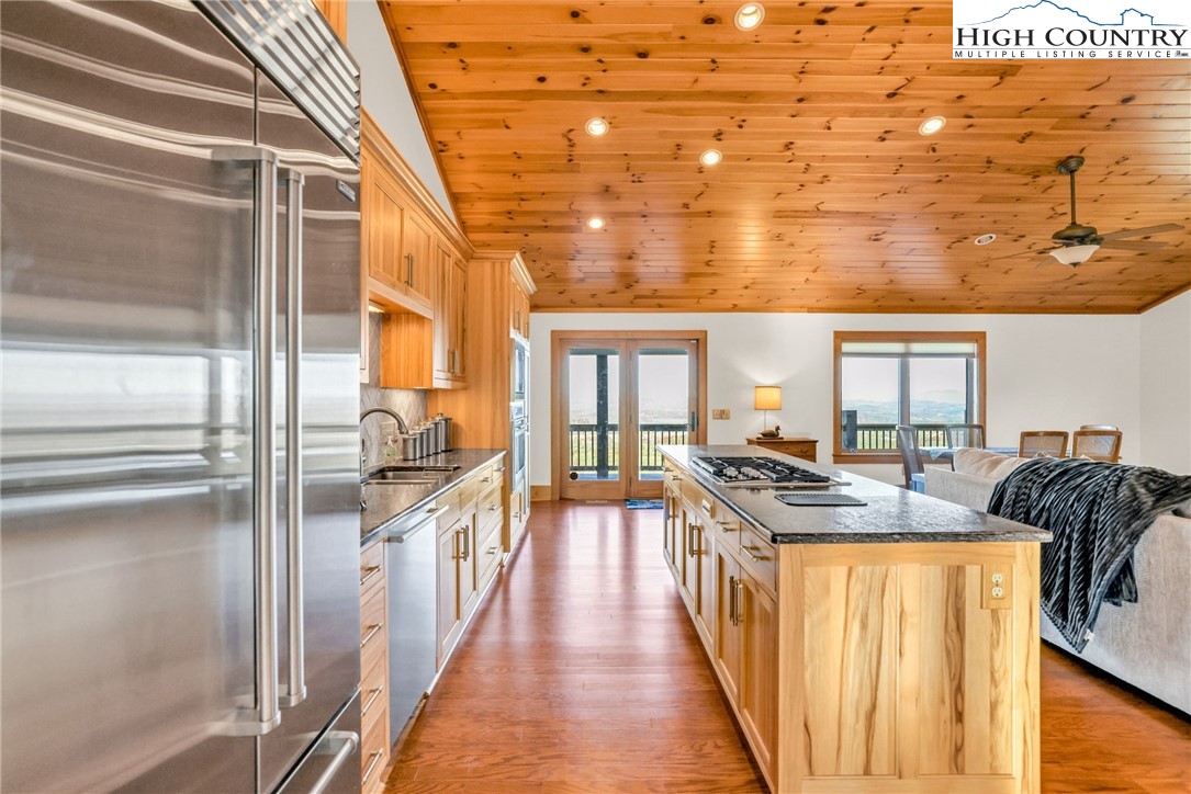 324 Rocky Ridge Lane Glade Valley, NC 28627 - Photo 26 of 43 a view of a kitchen with a large window