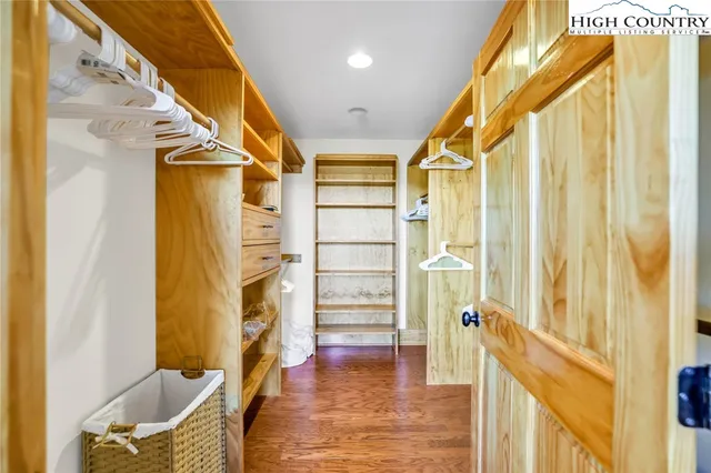 a view of a hallway with washer and dryer